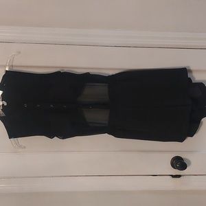 BCBG sheer black  romper  open lower back wirh expandible waist band  size small